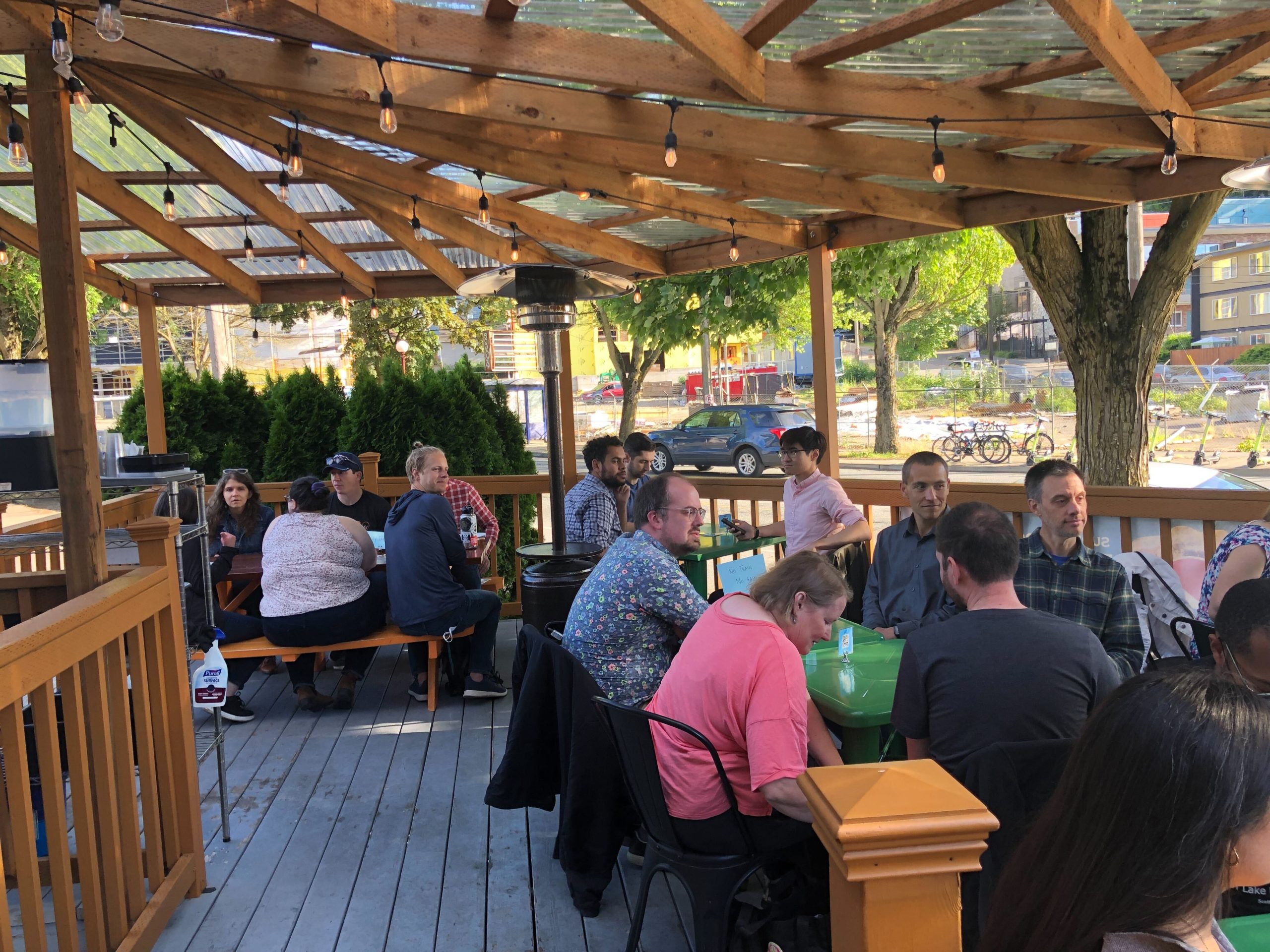 Transit Trivia participants sitting on an outdoor patio