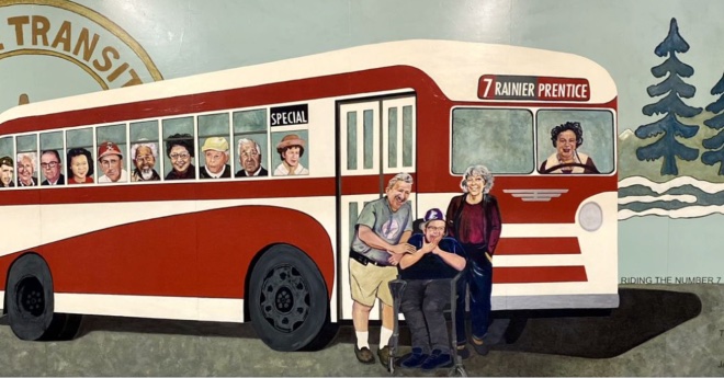 A mural shows the number 7 bus filled with local historical figures.