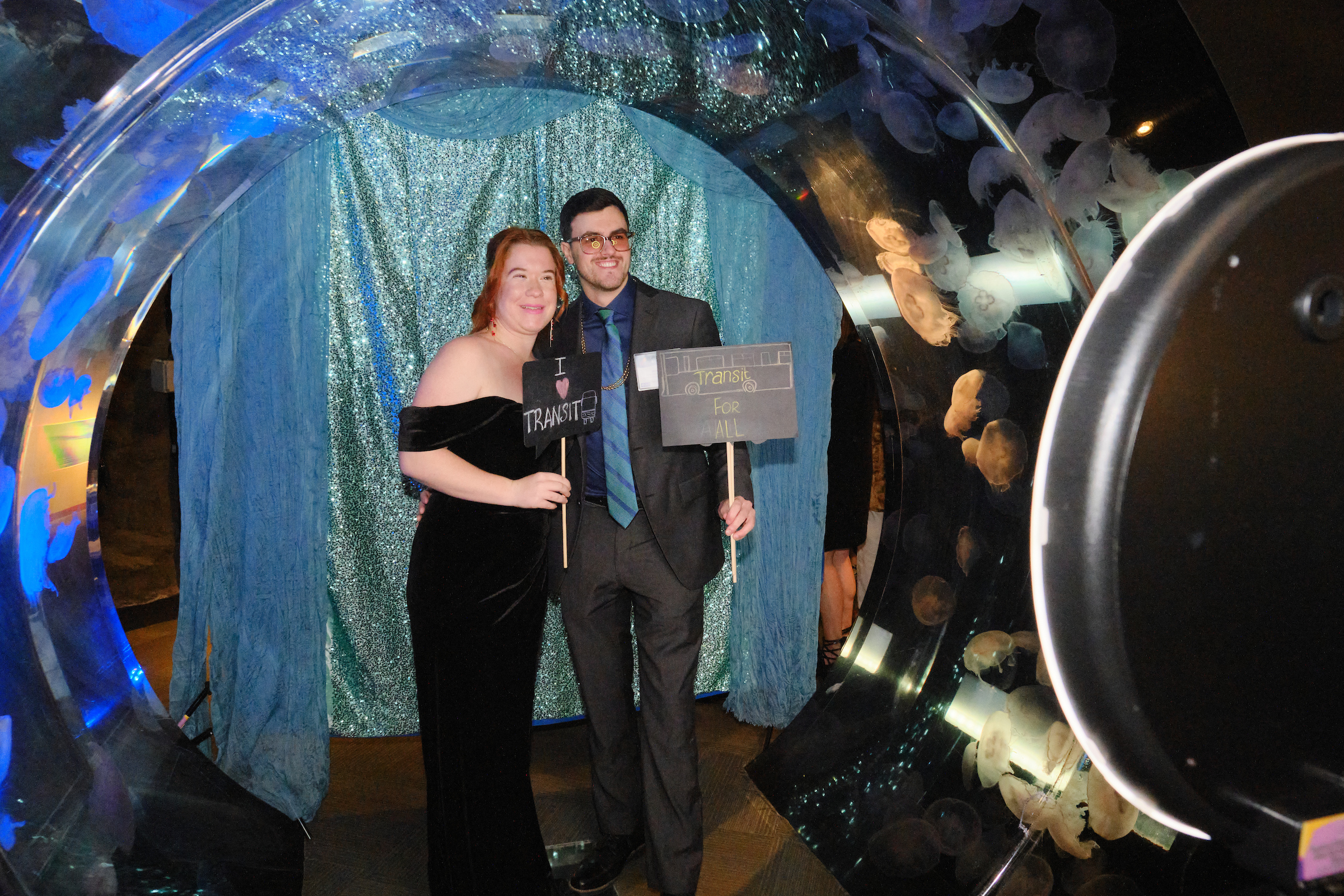 Guests pose in the jellyfish photo booth.  