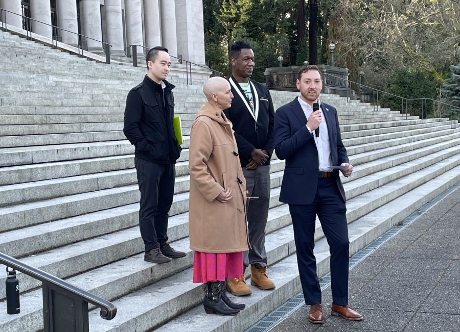 Researcher Ethan C. Campbell, Senator Rebecca Saldaña, community member DeAndre Anderson, and TCC Advocacy Director Matthew Sutherland give a press conference on the steps of the Legislative Building.