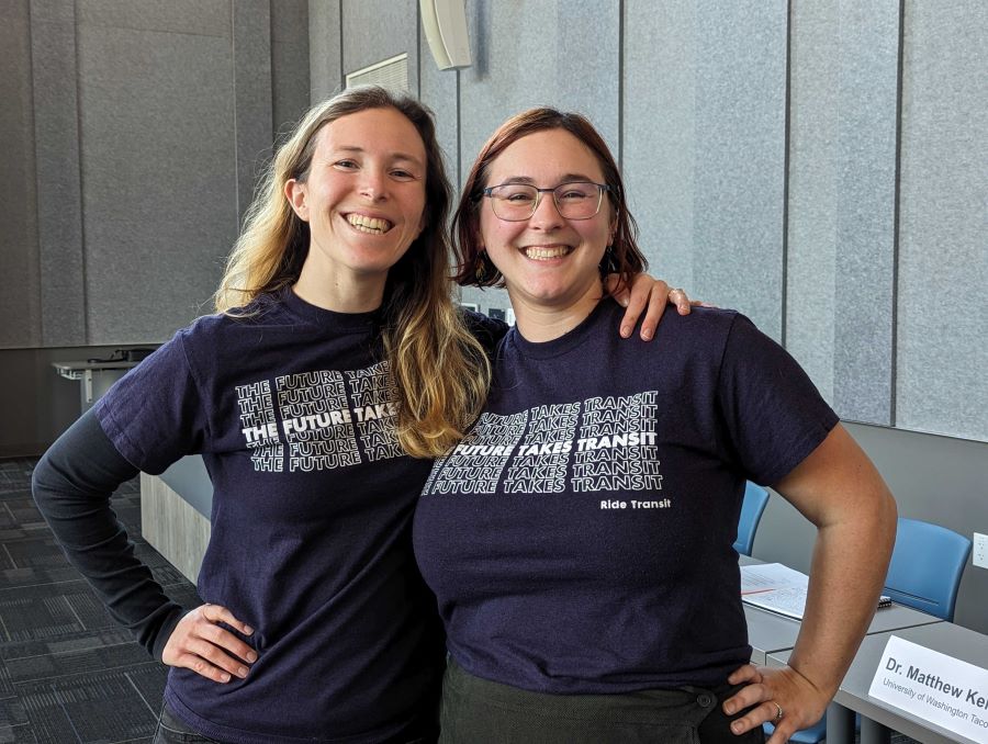 McKenna Lux and Laura Svancarek wear matching t-shirts with the text 