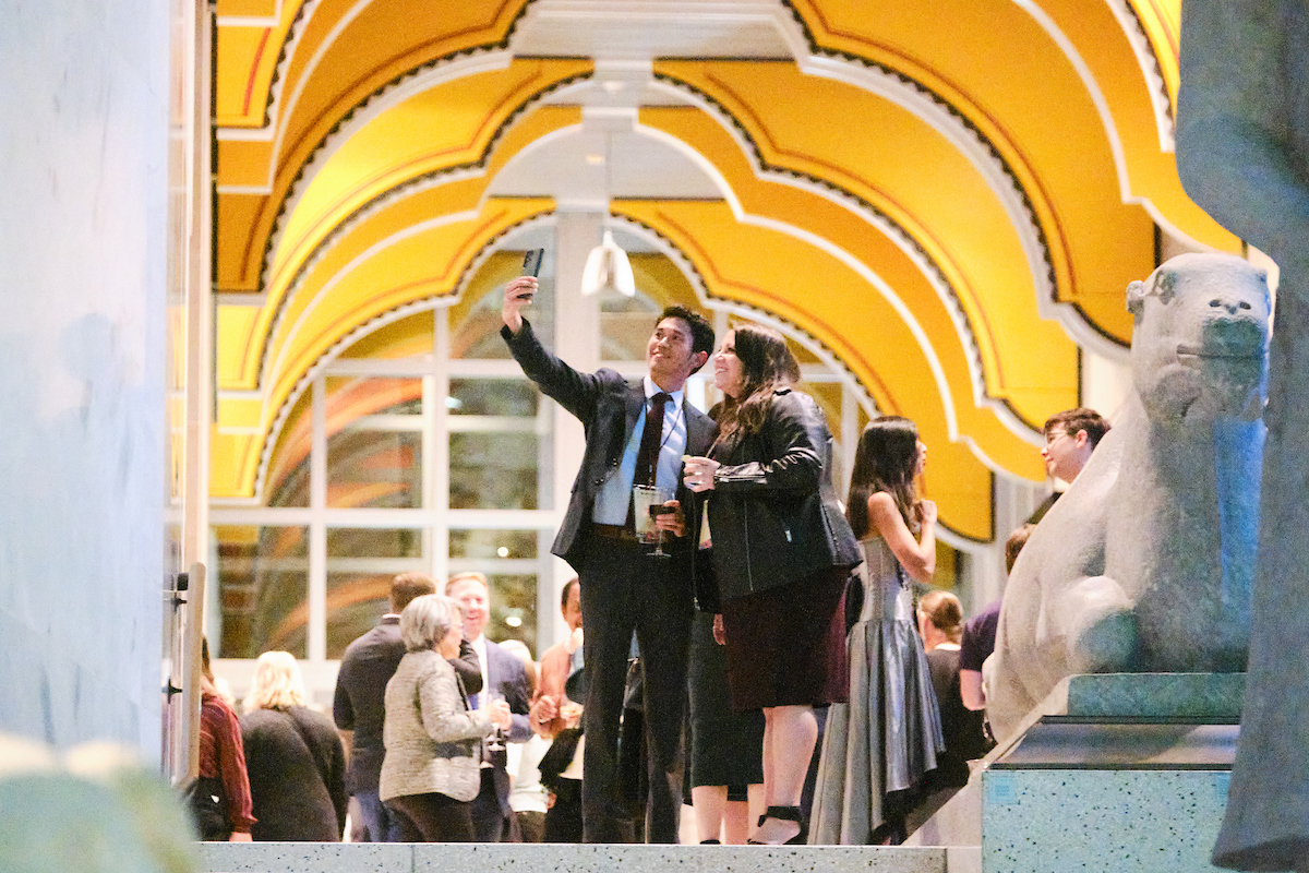 Guests take a selfie at the top of the SAM staircase. 