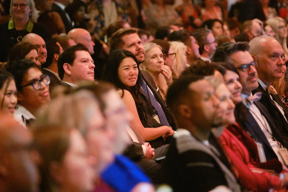 Guests look up at the stage.