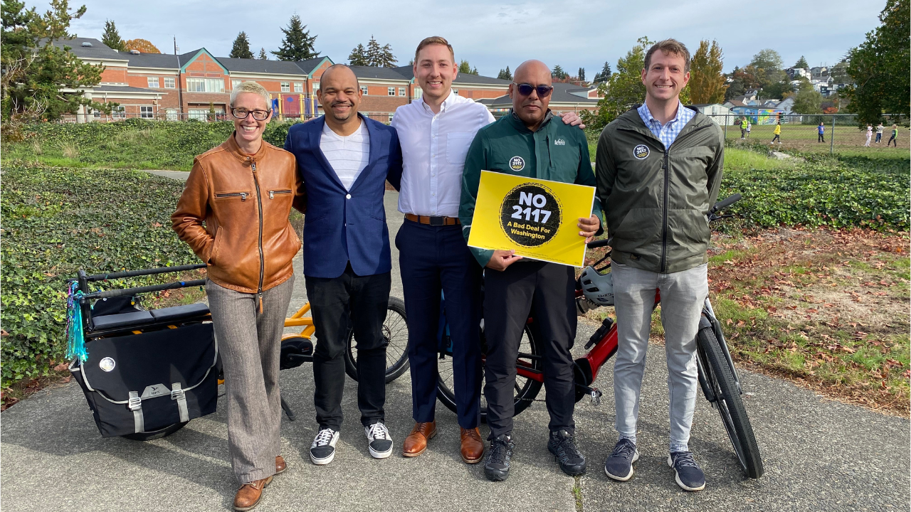 No on 2117 press event TCC staff getting out the vote for the Keep Seattle Moving campaign pose alongside No on 2117 volunteers.