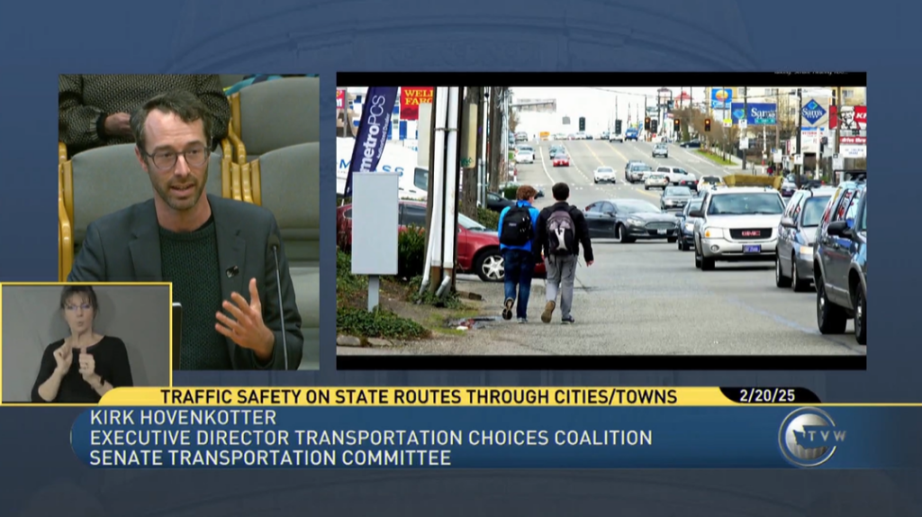 Screenshot of TCC Executive Director Kirk Hovenkotter testifying to the Senate Transportation Committee. Inset is a slide from his presentation showing two young people walking along Aurora Ave N where there is no sidewalk. 
