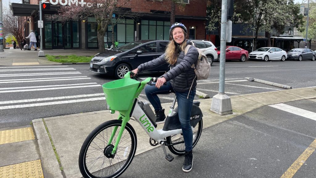 TCC's Deputy Director McKenna Lux rides a Lime Bike
