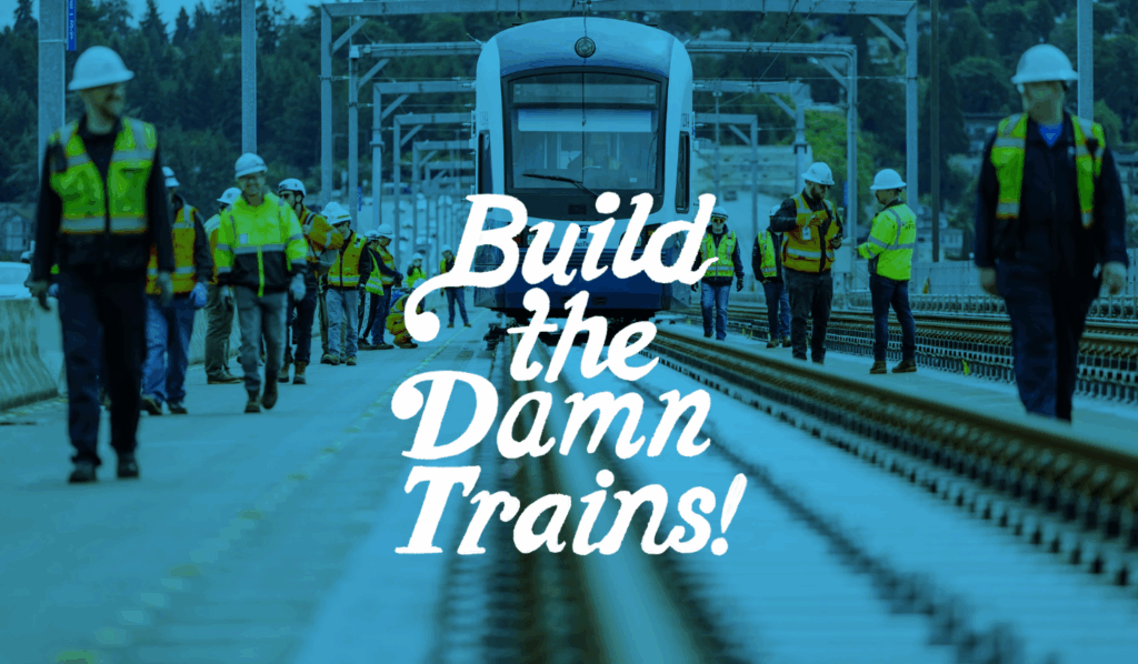 Photo of construction workers walking alongside a Link light rail vehicle with an overlaid logo that reads: Build the Damn Trains!