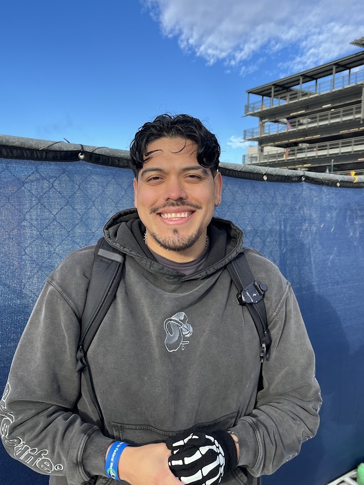 Photo of a man in a grey hoodie