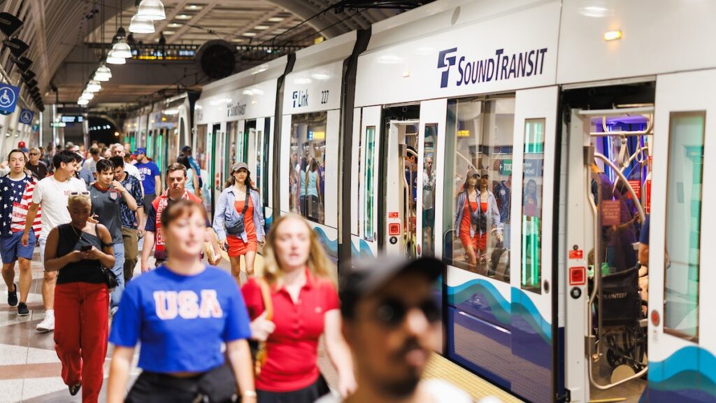 Fans on Link arrive at Pioneer Square Station for the FIFA World Cup game in Seattle between the USA and Belguim on July 6, 2026.