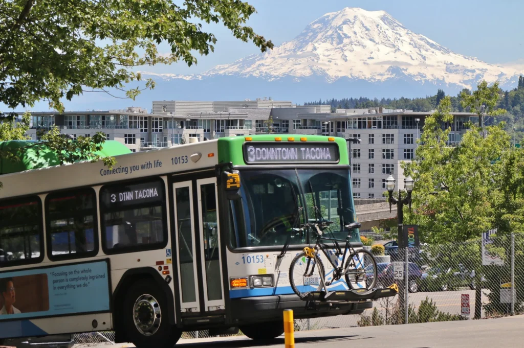 Photo of a Pierce Transit bus in front of Mount Rainier by Bruce Englehardt.